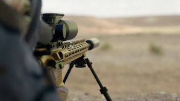 Tactical rifle in desert